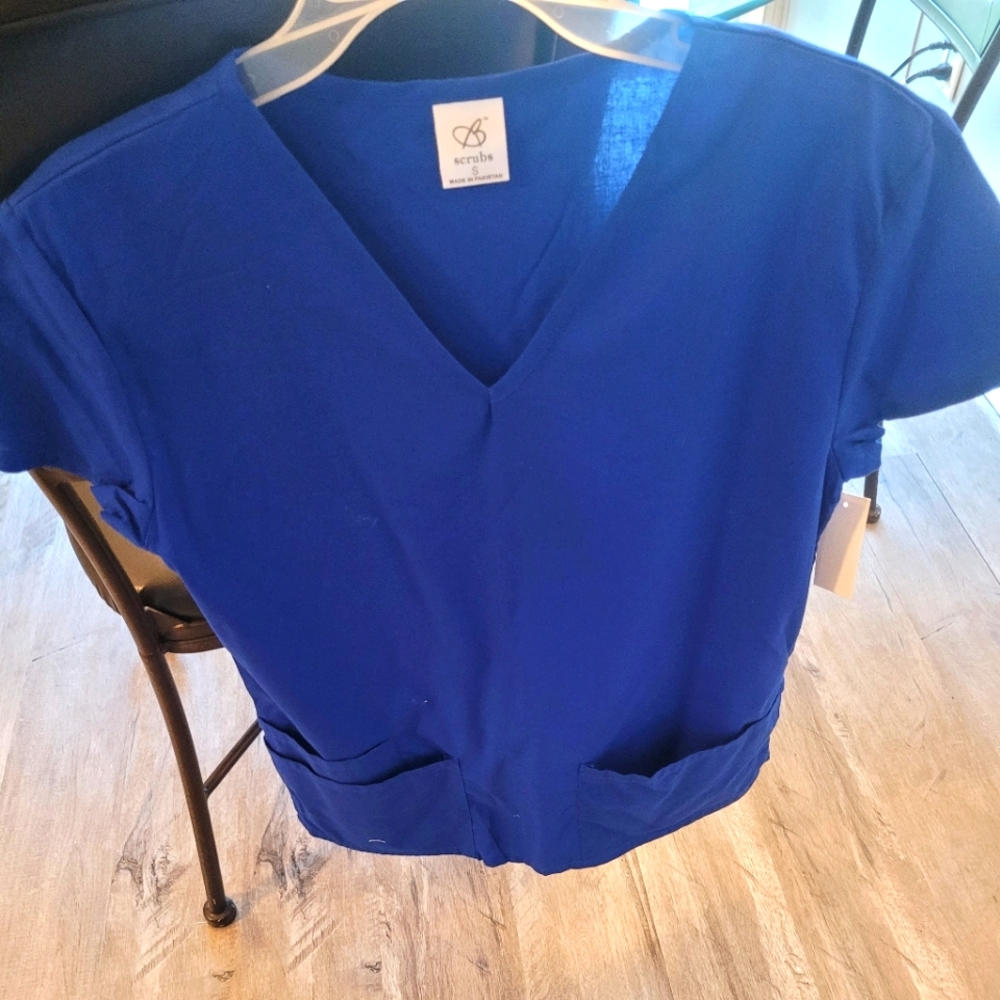 NEW Scrub top. I have many more. Bundle and save.Ships with order of 2 or more.